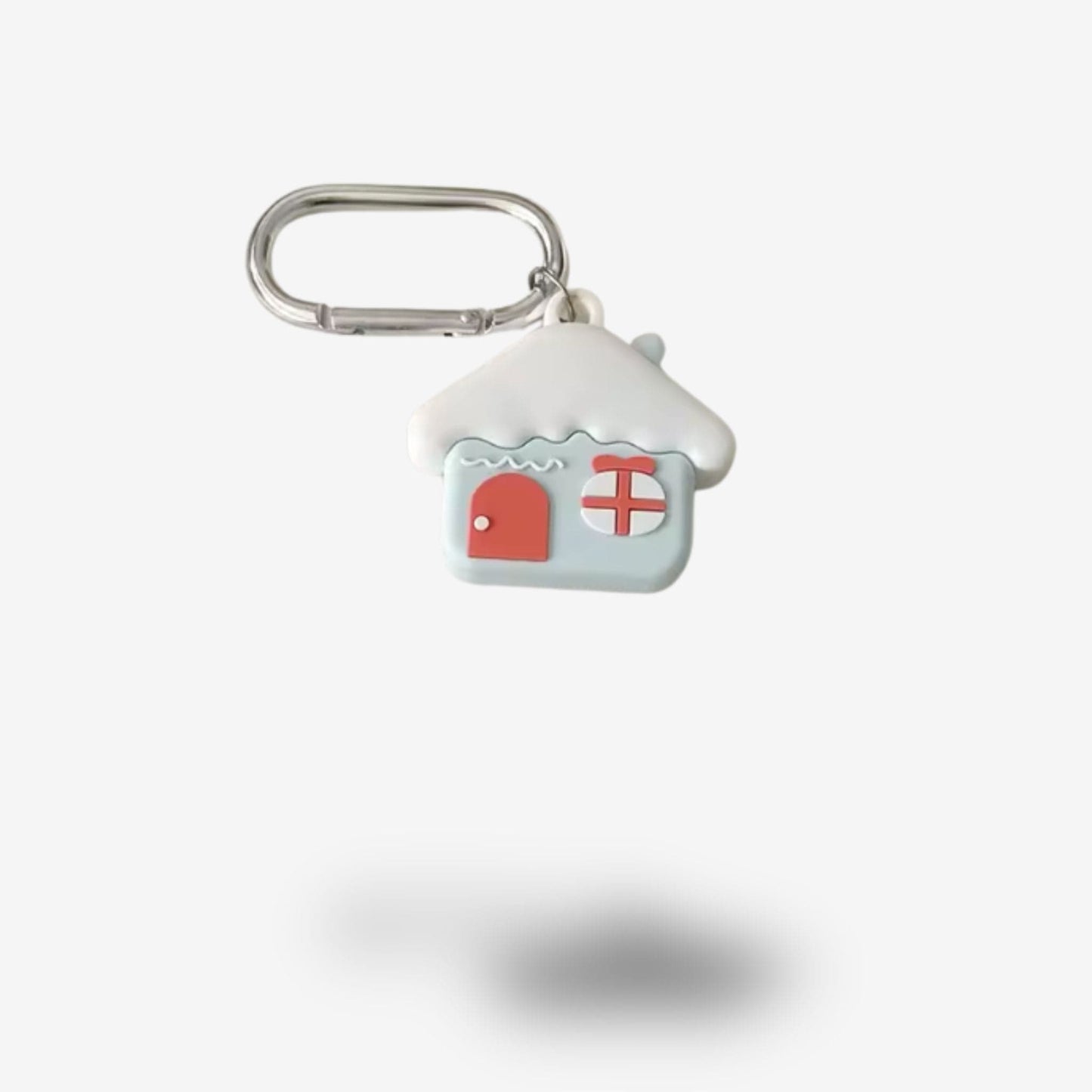 Traceur GPS Enfant <br> Maison Enneigée en Silicone, Ambiance Hivernale et Mousqueton Pratique