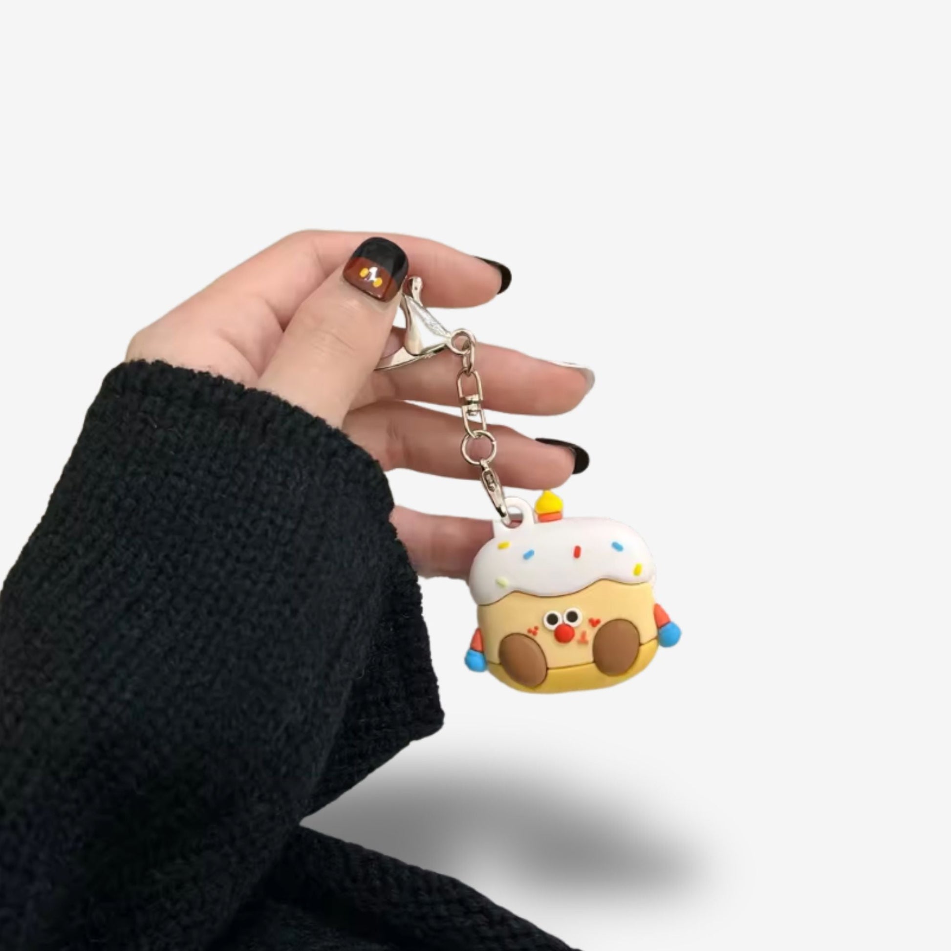 Traceur GPS Enfant <br> Bonhomme en Gâteau Rigolo, en Silicone avec Mousqueton